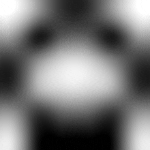 a black and white photo of a person 's torso with a blurred background .