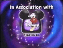 a disney channel logo with mickey mouse on it .