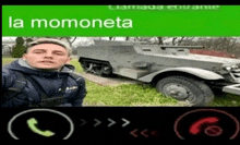 a man taking a selfie next to a military vehicle with the words la momoneta on the top