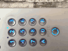 a close up of a keypad that says porte on the bottom