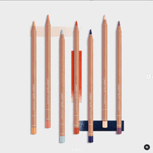 a row of colored pencils that say caran d'ache