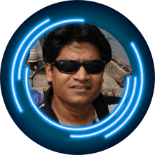 a man wearing ray-ban sunglasses is surrounded by a blue glowing circle