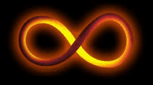 a red and yellow infinity symbol is glowing in the dark .