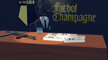 a man in a suit sits at a table in front of a sign that reads futbol champagne