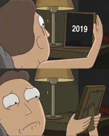 a cartoon of a man holding a framed picture with the year 2019 on it