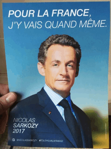 a poster of a man in a suit and tie says pour la france