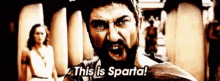 a man with a beard is screaming that he is sparta