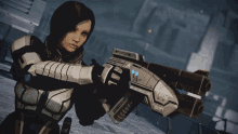 a woman is holding a gun that says vfx on it