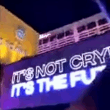 a purple sign that says it 's not cry it 's the fu .