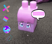 a pink block with anime eyes and a speech bubble that says hi i 'm angelina