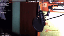 a microphone is on a screen that says tremixus at the top