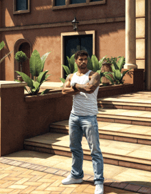 a man with a tattoo on his arm is standing in front of a building