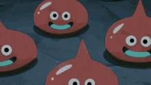 a bunch of red cartoon characters with blue eyes and smiles on their faces