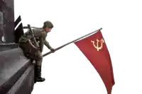 a soldier is holding a red flag with the hammer and sickle on it