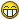 a pixelated smiley face with a big smile on it 's face