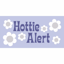 a sign that says hottie alert with yellow and white daisies