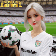 a woman holding a soccer ball in front of a museum bola ad