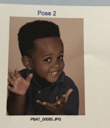 a picture of a young boy in a blue shirt is titled pose 2