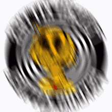 a blurry image of a circle with a yellow object in it