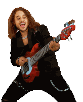 a man with long hair playing a red bass guitar