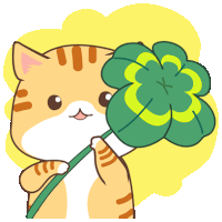 a cat is holding a four leaf clover in its paws