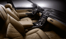 a picture of the interior of a car with the website http://wallpapers.com at the bottom