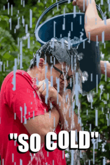 a man in a red shirt is being poured with water from a blue bucket with the words " so cold " written above him