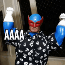 a man in a superhero costume is flexing his muscles and has the word aaa on his chest