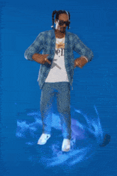 a man in a plaid shirt with the word tide on it is surrounded by blue smoke