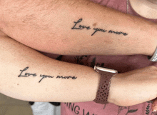 a man and a woman have matching tattoos on their arms that say love you more