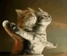 two cats are hugging each other with their arms outstretched in a painting .