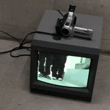 a sony television with a video camera attached to it