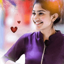 a woman in a purple shirt is smiling with two red hearts above her head