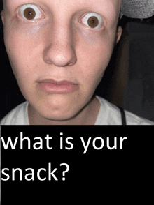 a close up of a man 's face with the words what is your snack below it