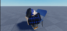 a person with blue hair is laying down on a blue folding chair