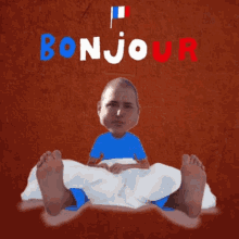 a man in a blue shirt is laying on a bed with the word bonjour above him