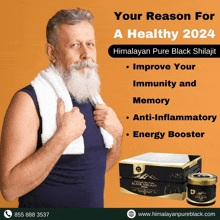 a man with a towel around his neck is standing next to a box of himalayan pure black shilajit