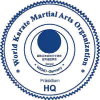 the logo for the world karate martial arts organization is blue