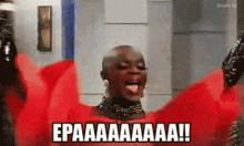 a woman in a red dress is saying epaaaaaaa !!