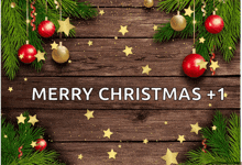 a merry christmas sign with christmas decorations on a wooden background