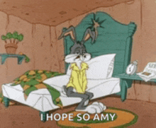 a cartoon of bugs bunny sitting on a bed with the words i hope so amy below him