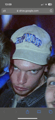 a man wearing a hat that says ripndip looks at the camera