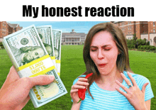 a woman eating a red pepper next to a stack of money that says $ 1,000 on it