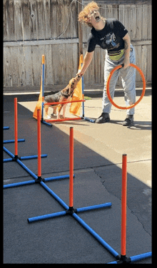 a man wearing a shirt that says ' agility ' on it