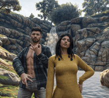 a man and a woman standing next to each other with a waterfall in the background