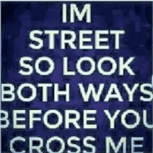 a purple sign that says im street so look both ways before you cross me