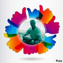 a man is sitting on the beach in a colorful circle with a picture of him in it .