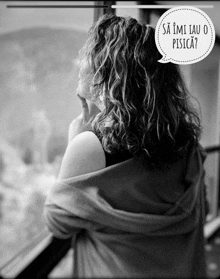 a black and white photo of a woman looking out a window with a speech bubble that says sa imi au o pisica