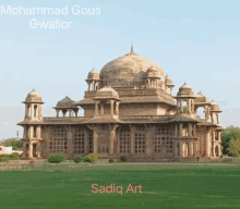 a picture of a building with the name sadiq art written on the bottom