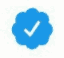 a blue circle with a white check mark inside of it .